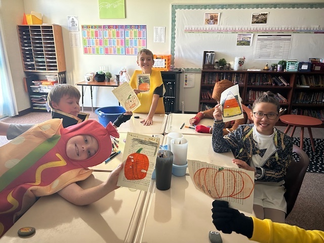 Kids participating in Halloween activities.