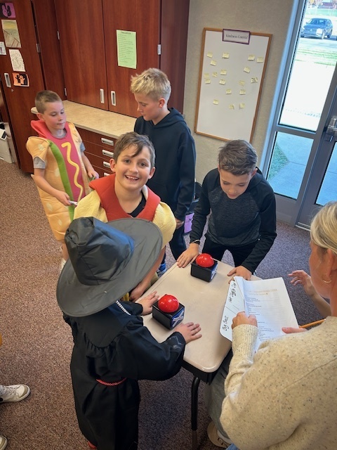 Kids participating in Halloween activities.