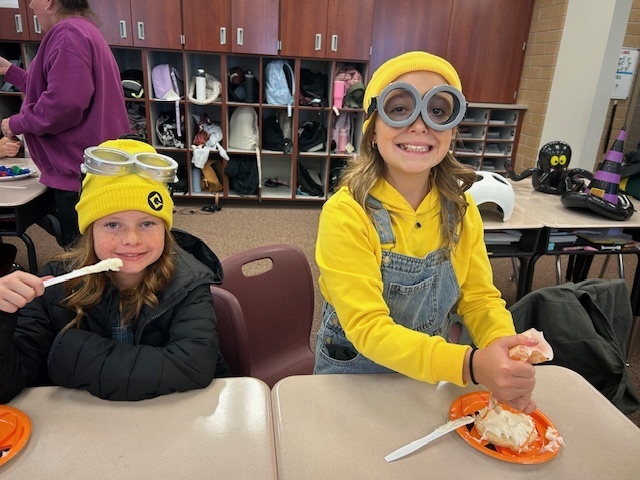 Kids participating in Halloween activities.
