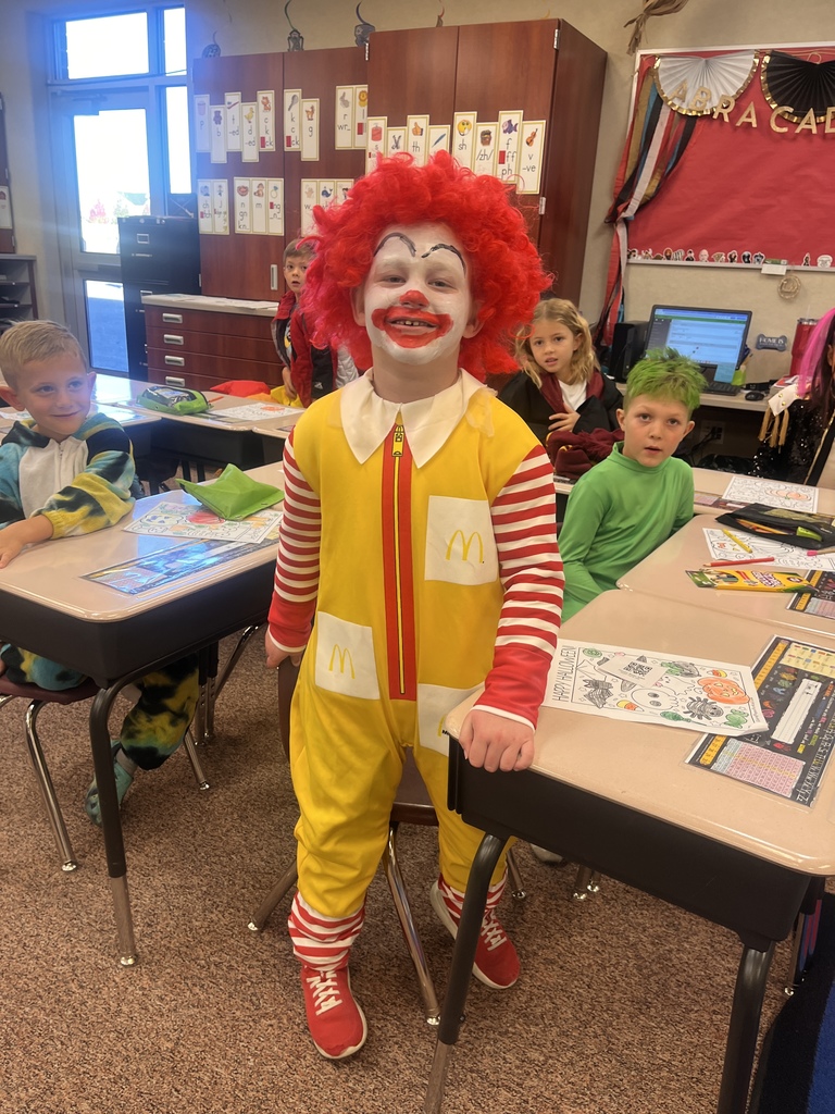 Kids participating in Halloween activities.