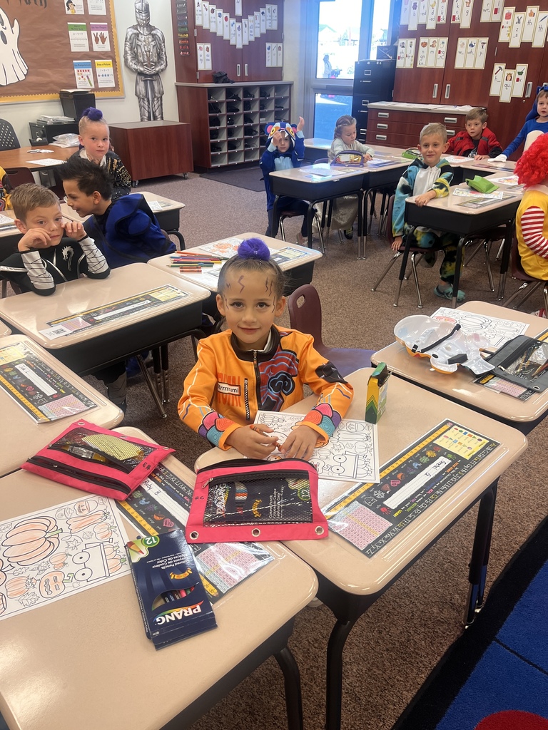 Kids participating in Halloween activities.