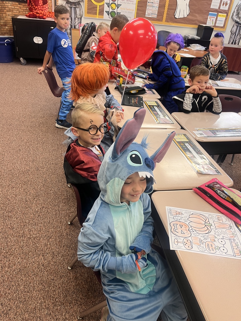 Kids participating in Halloween activities.