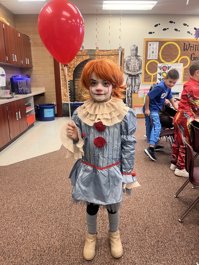 Kids participating in Halloween activities.