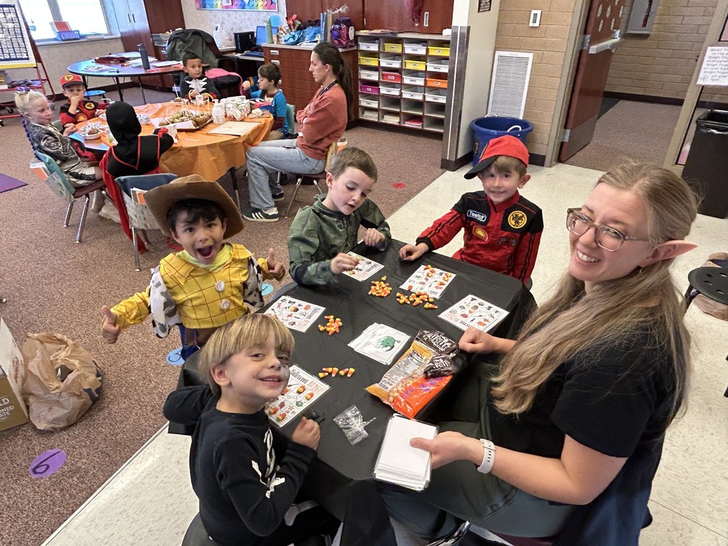 Kids participating in Halloween activities.