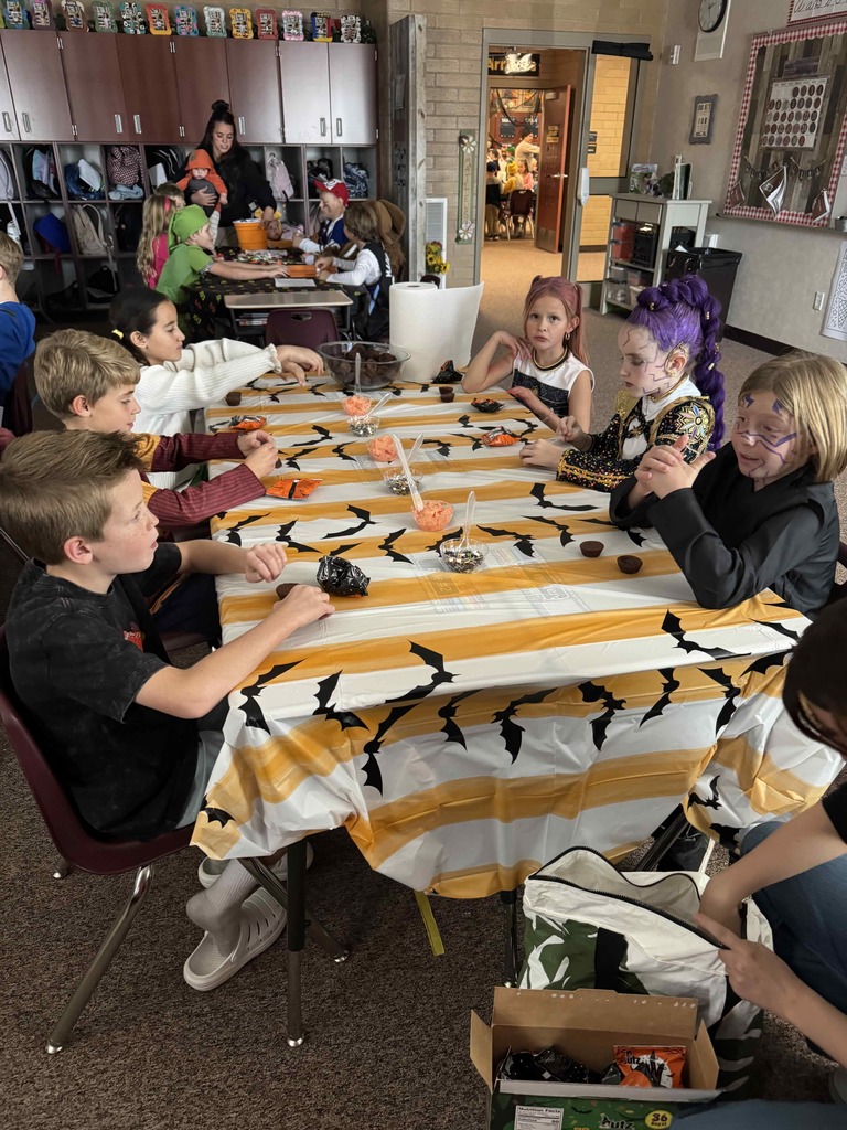 Kids participating in Halloween activities.