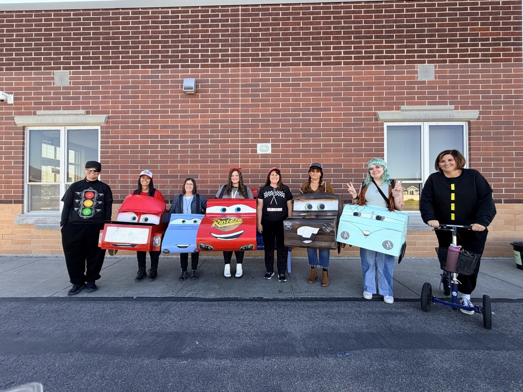 Technicians dressed as characters from Cars.