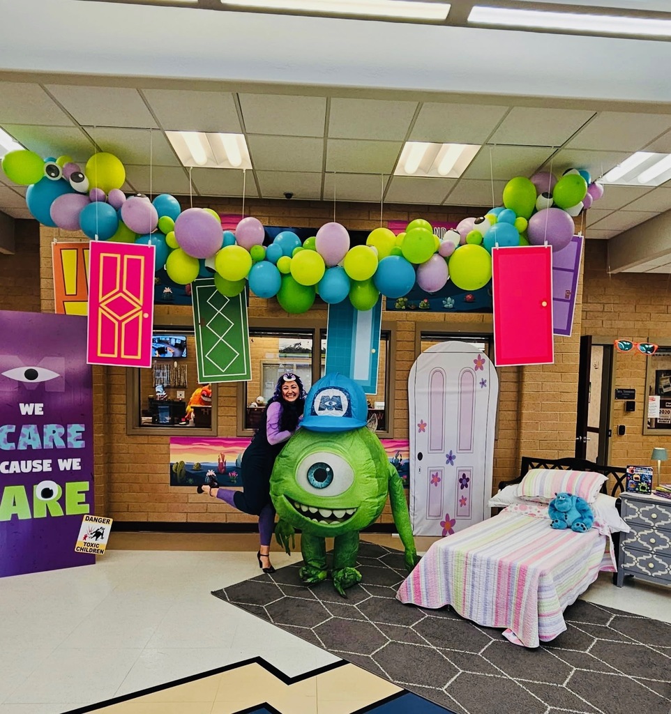 Teachers dressed as characters from Monsters Inc.