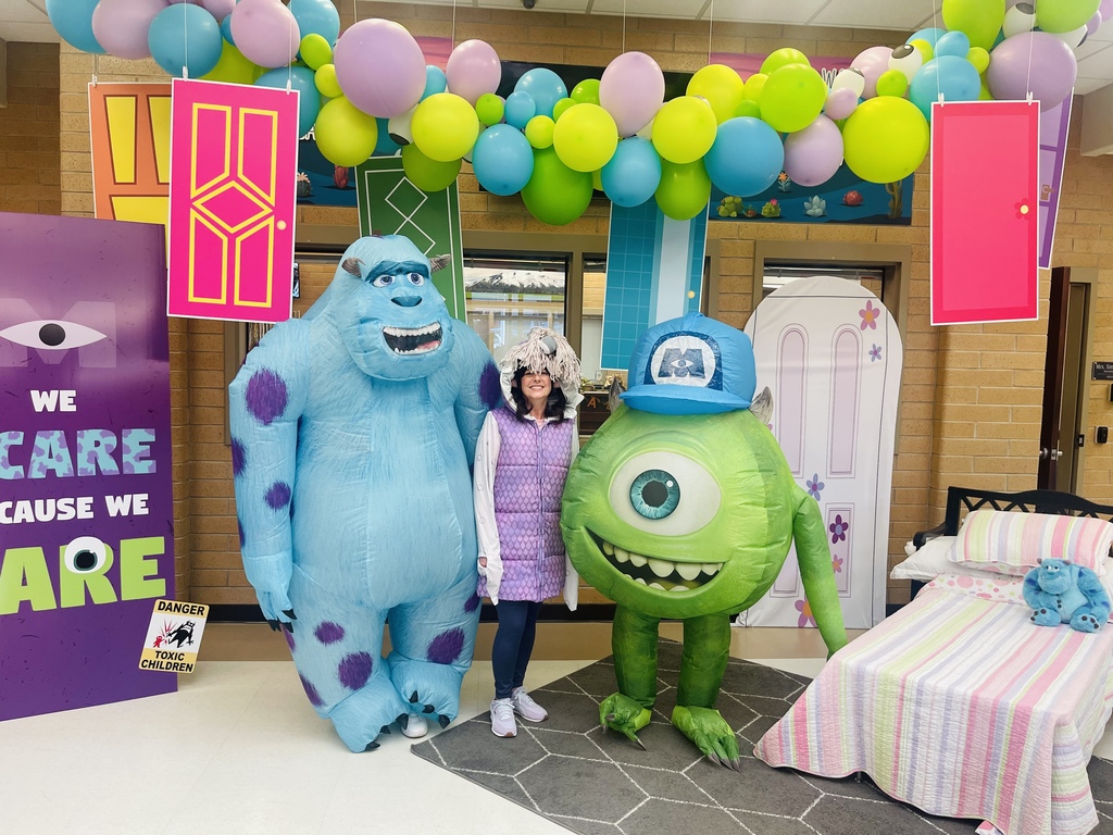 Teachers dressed as characters from Monsters Inc.