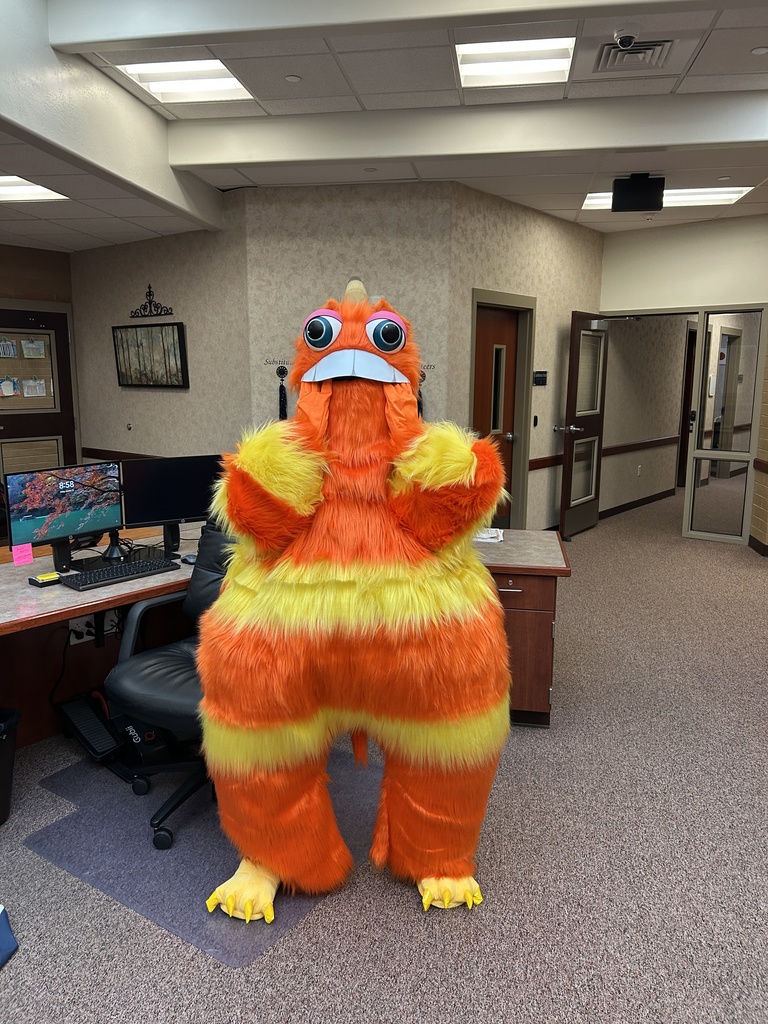 Teachers dressed as characters from Monsters Inc.