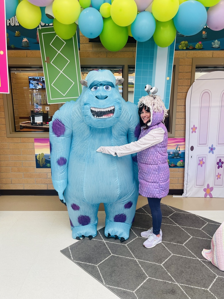 Teachers dressed as characters from Monsters Inc.