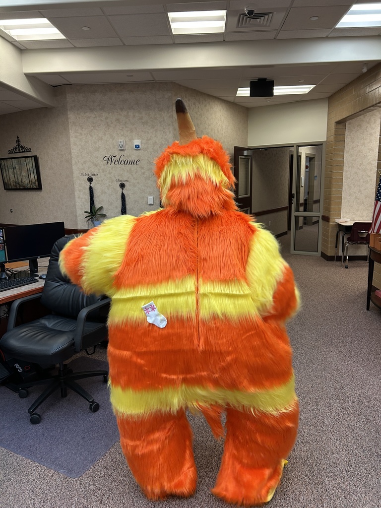 Teachers dressed as characters from Monsters Inc.