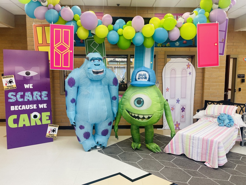 Teachers dressed as characters from Monsters Inc.