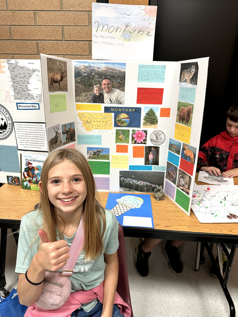 Student with poster of Montana