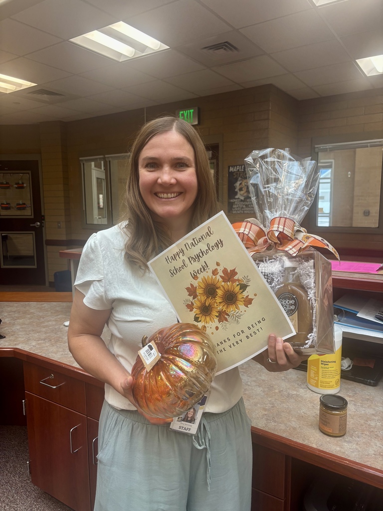 Mrs. Sonntag holding gifts for National School Psychologist Week.