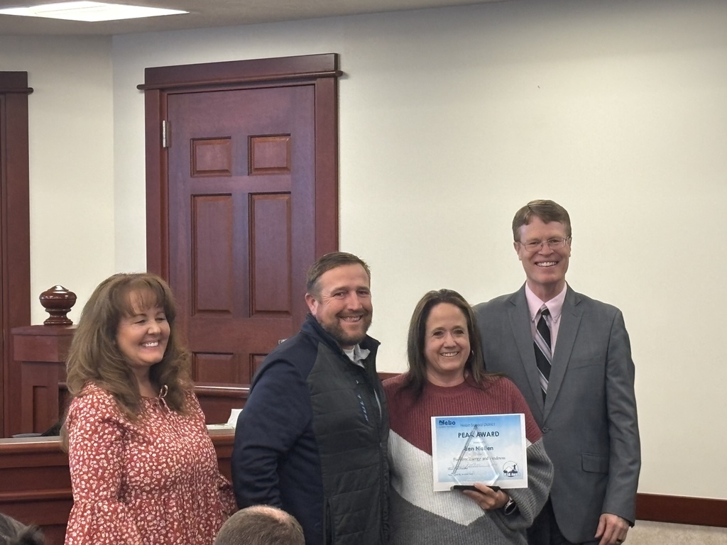 Jen Nielson- Peak award winner with Rick Nielson, Board Member, & Andy Gull