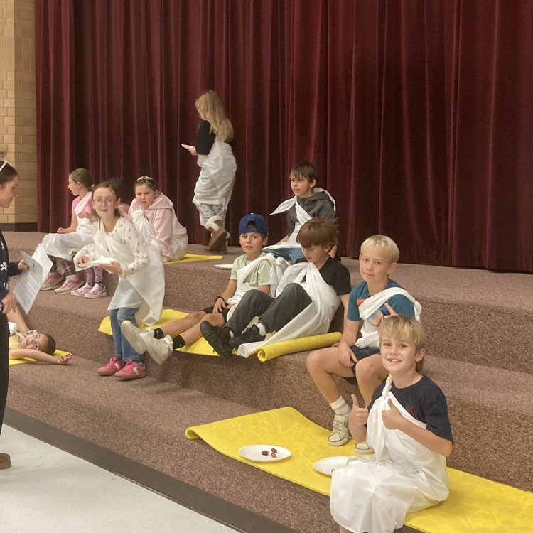 students enjoying a Roman snack