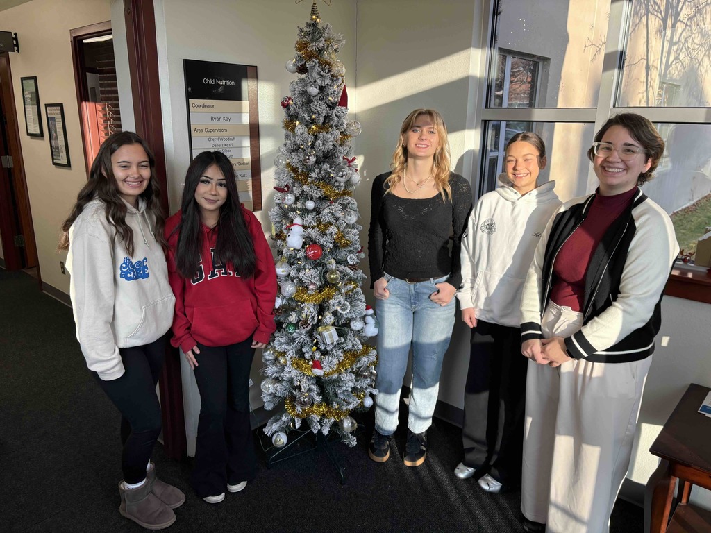 Interior design students decorate tree