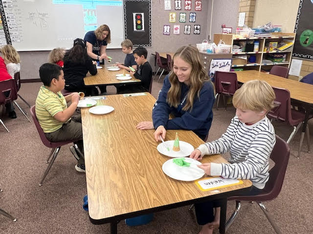 Students decorating an ice cream cone