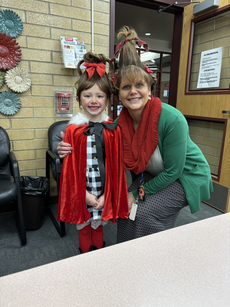 Principal and student dresses up as Cindy Lou 