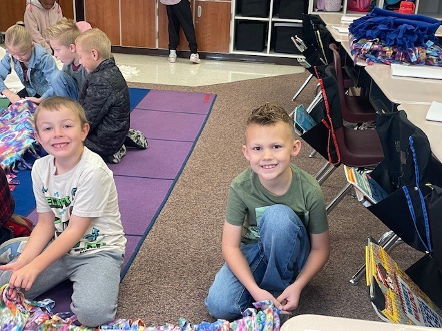 Mrs. Coon's Class Tying Blankets