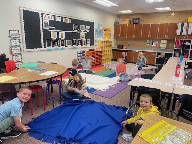 Mrs. Coon's Class Tying Blankets