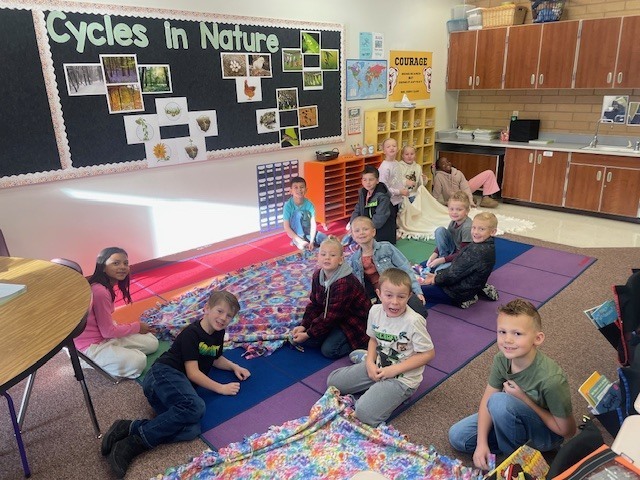 Mrs. Coon's Class Tying Blankets