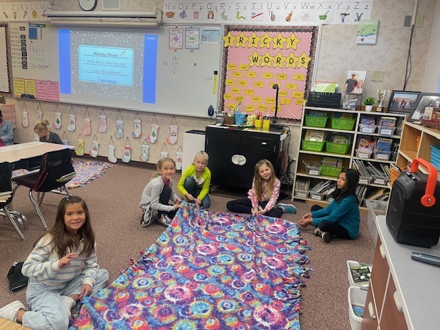Mrs. Coon's Class Tying Blankets