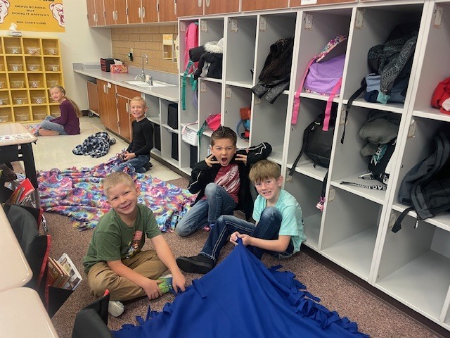 Mrs. Coon's Class Tying Blankets