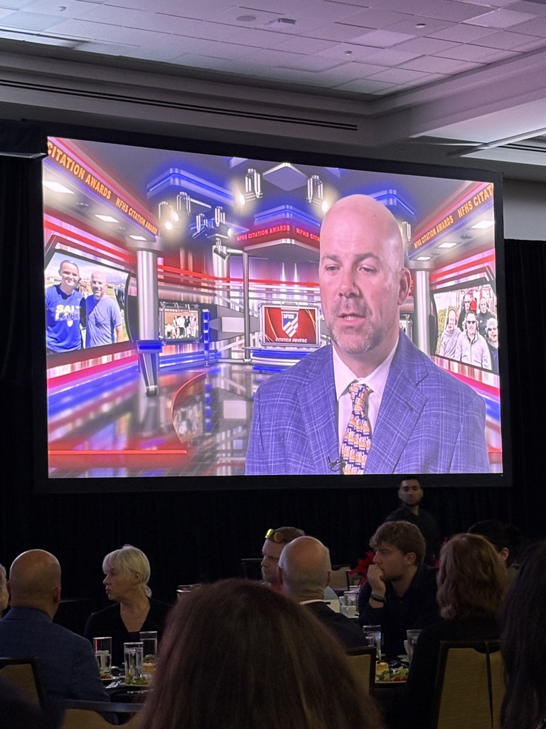 Lee Gillie Receiving the NFHS's Distinguished Citation award at their national conference