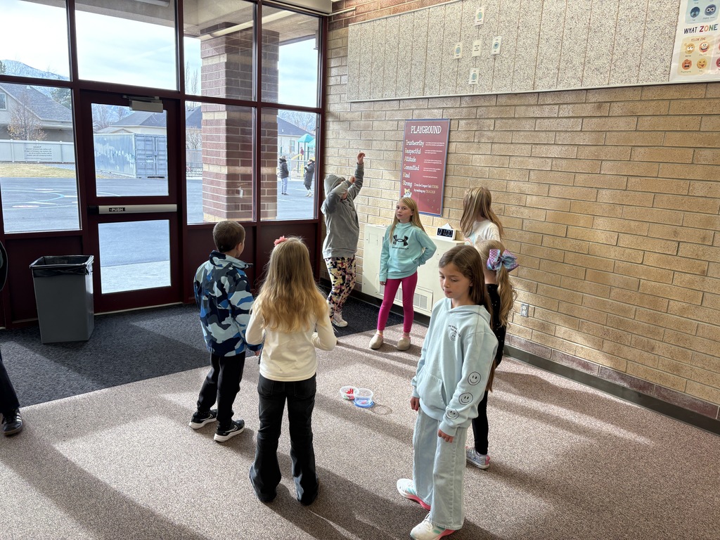 students playing charades