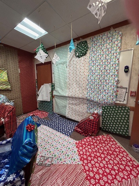 The elves visit Mrs. McEntire