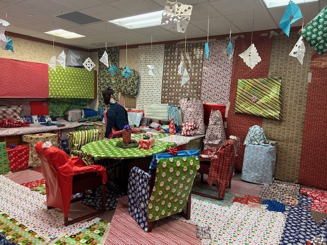 The elves visit Mrs. McEntire