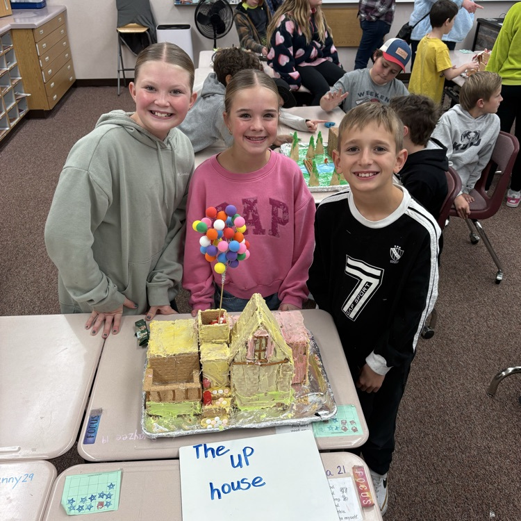 girls with gingerbread house