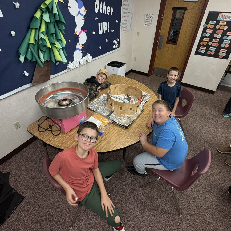 gingerbread house with boys 