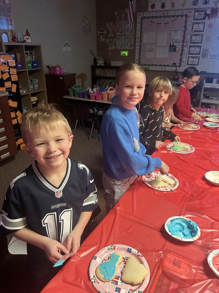Decorating sugar cookies in Ms. Chappell's room.