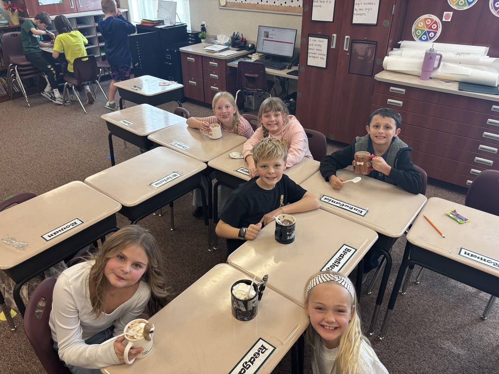 Ugly Christmas mug party in Mrs. Berglund's room.