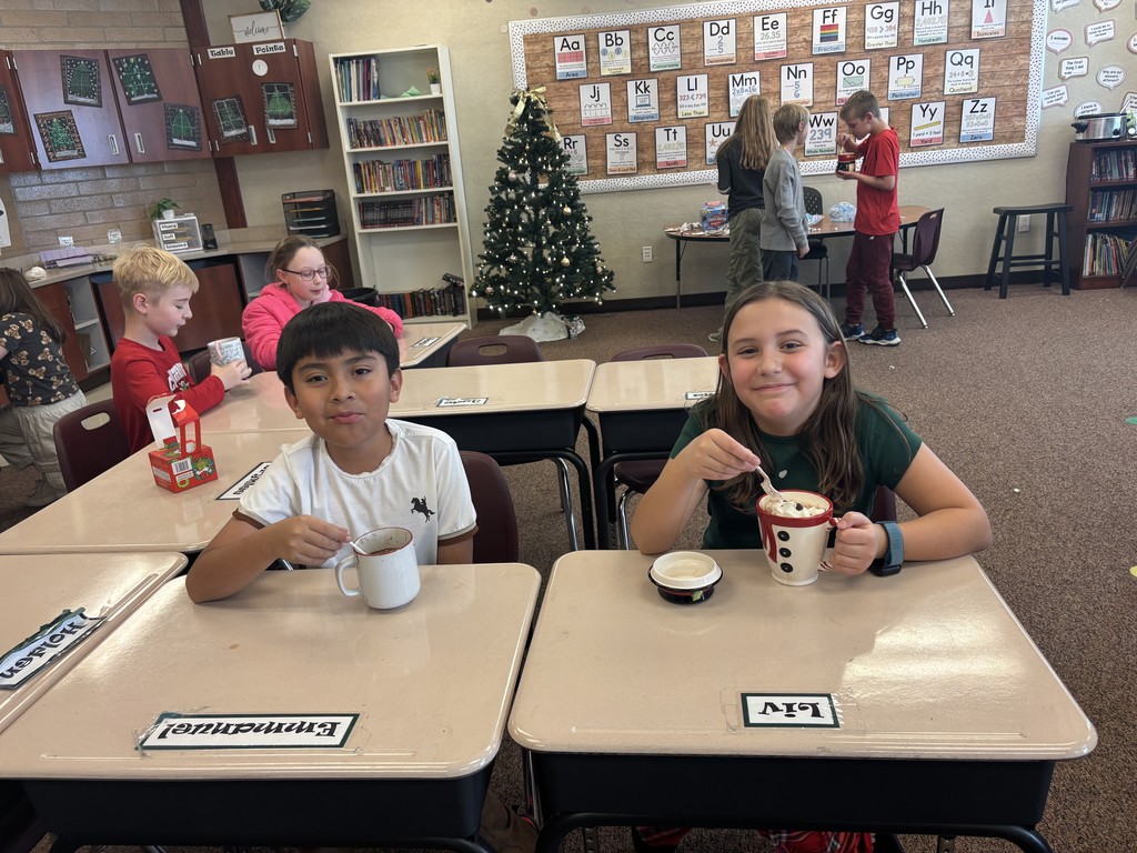 Ugly Christmas mug party in Mrs. Berglund's room.
