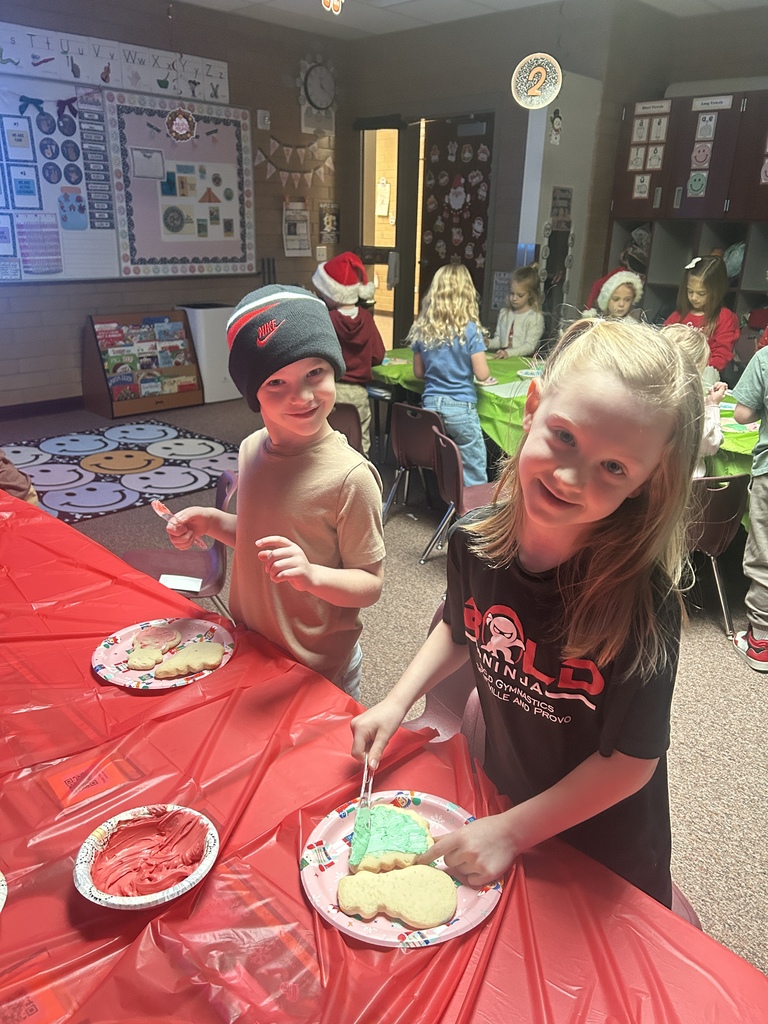 Decorating sugar cookies in Ms. Chappell's room.