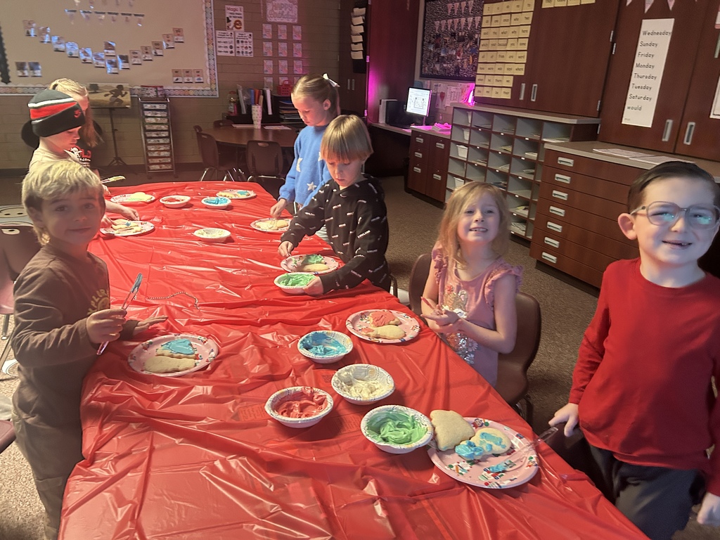 Decorating sugar cookies in Ms. Chappell's room.