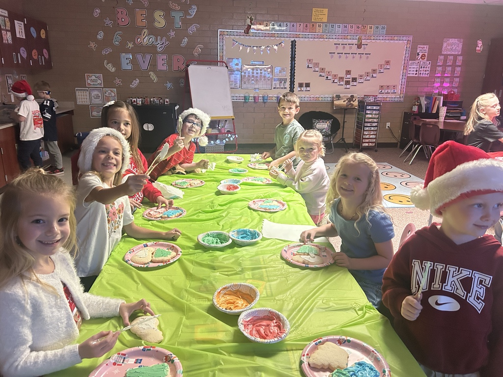 Decorating sugar cookies in Ms. Chappell's room.