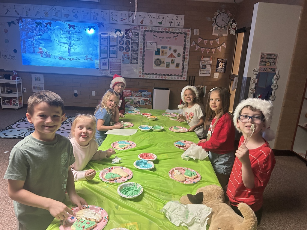 Decorating sugar cookies in Ms. Chappell's room.