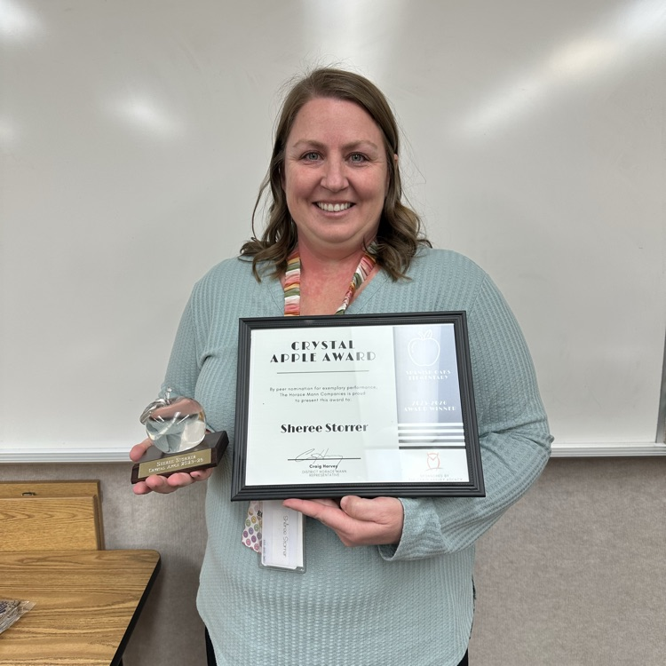 Sheree holding award