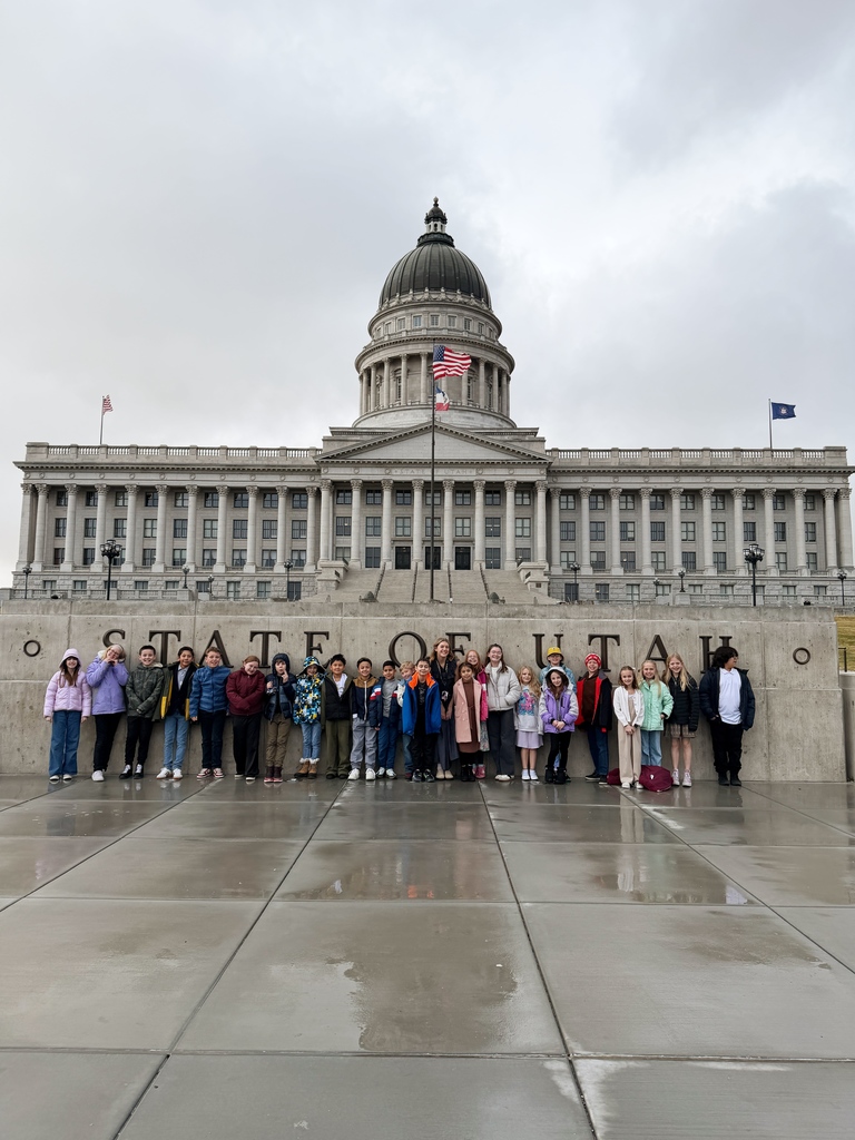 class posing outside the Capitol building