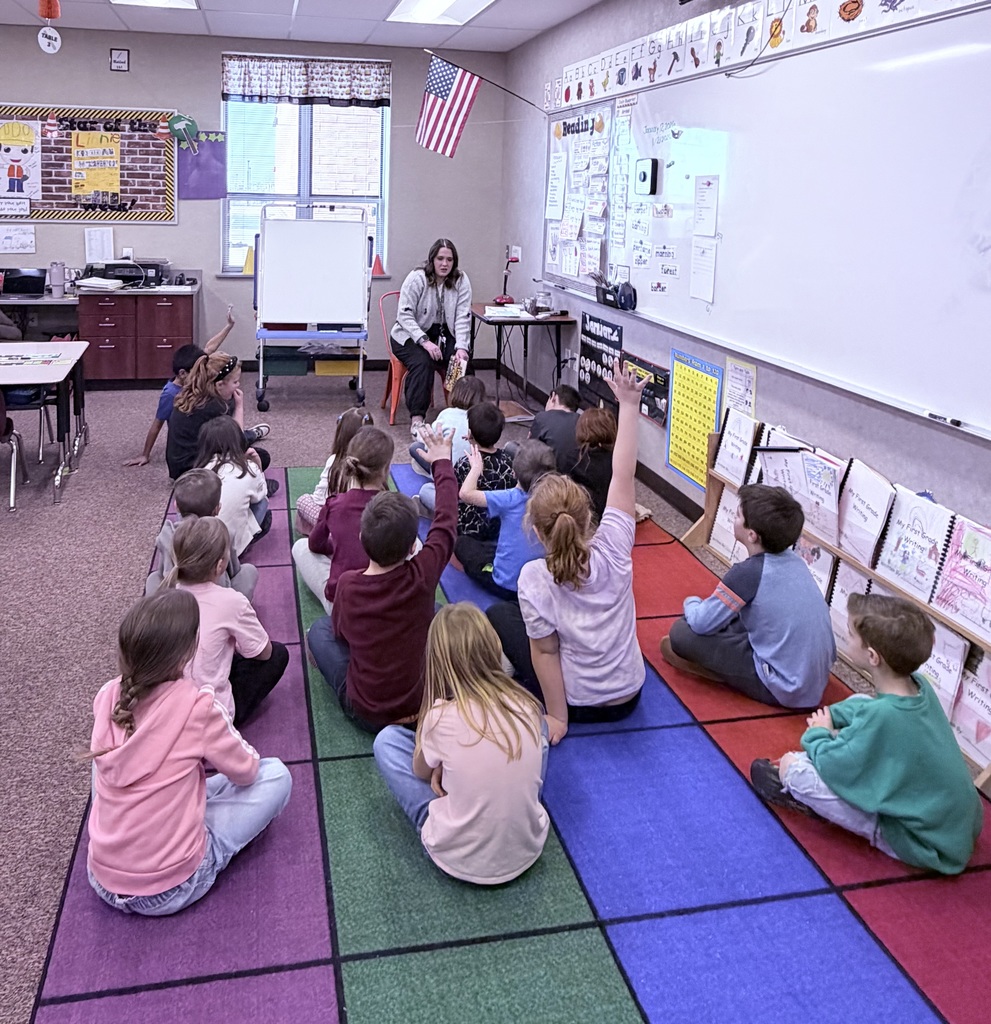students listening to our school counselor
