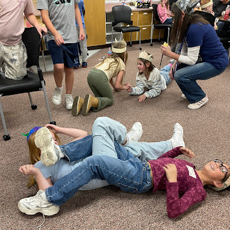 Students leg wrestling