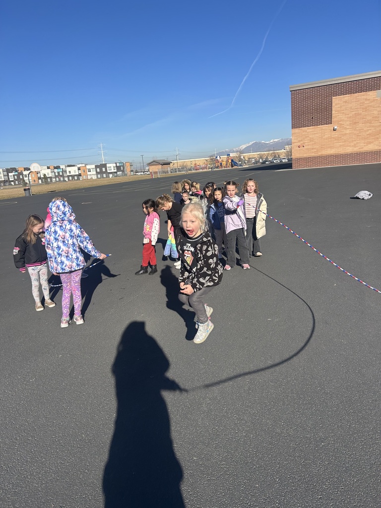 kindergarteners jumping