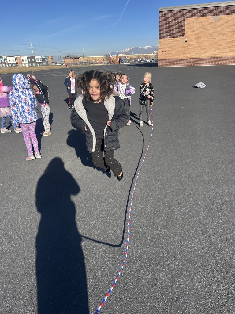 kindergarteners jumping