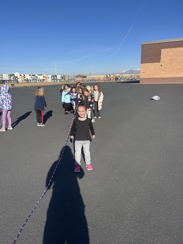 kindergarteners jumping