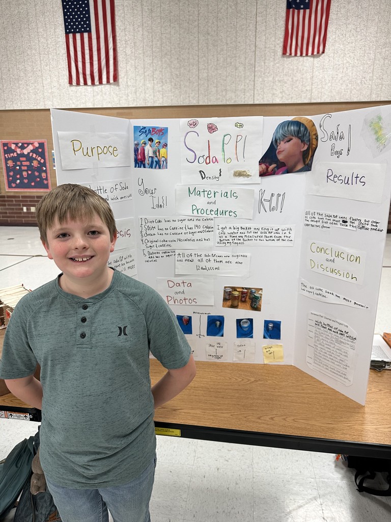 Student with science fair project