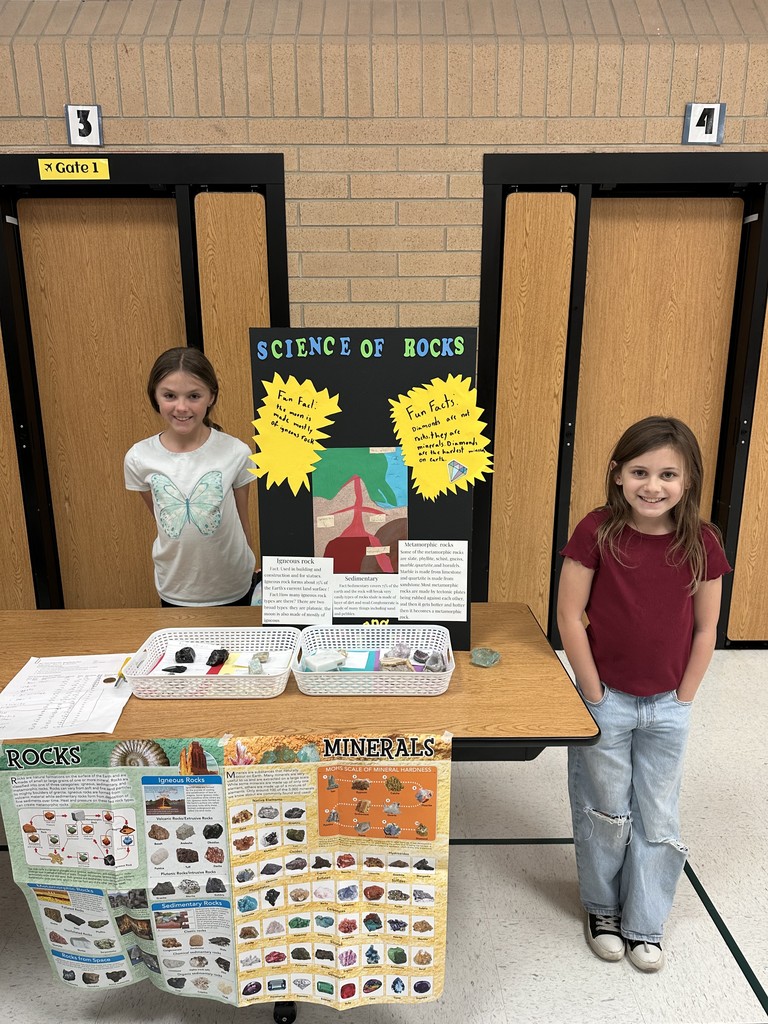 Students showing their science fair project